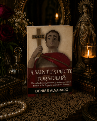 Book titled 'A Saint Expedite Formulary' by Denise Alvarado on a dark background with religious decor.
