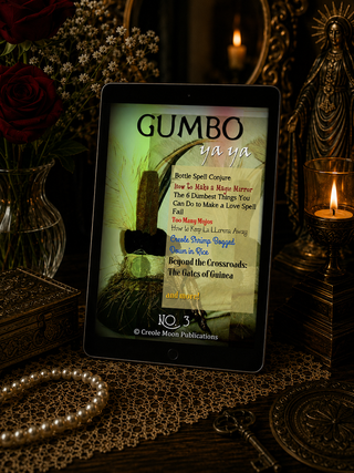 Tablet displaying a Gumbo recipe with candles and flowers in the background