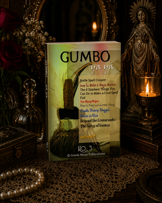 Book titled 'Gumbo ya ya' on a dark background with candles and decorative items.