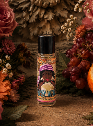 Roll-on bottle with decorative label surrounded by flowers and grapes