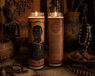 Two candles with illustrations and text on a rustic background