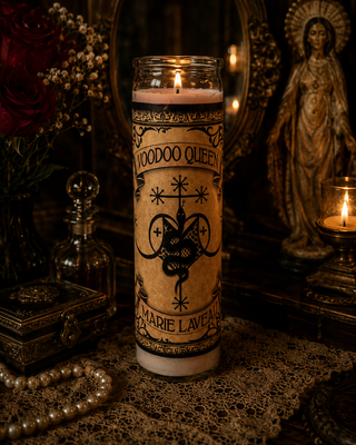 Candle with 'Voodoo Queen' text in a mystical setting with mirrors and statues.