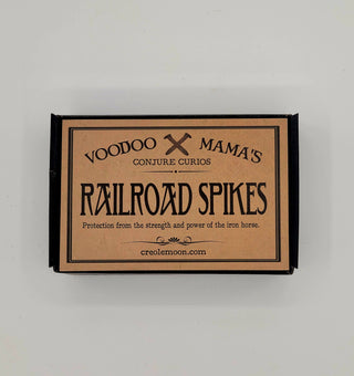 Box of Voodoo Mama's Railroad Spikes on a gray background