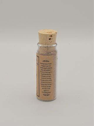 Banishing Conjure Powder in a glass corked bottle.